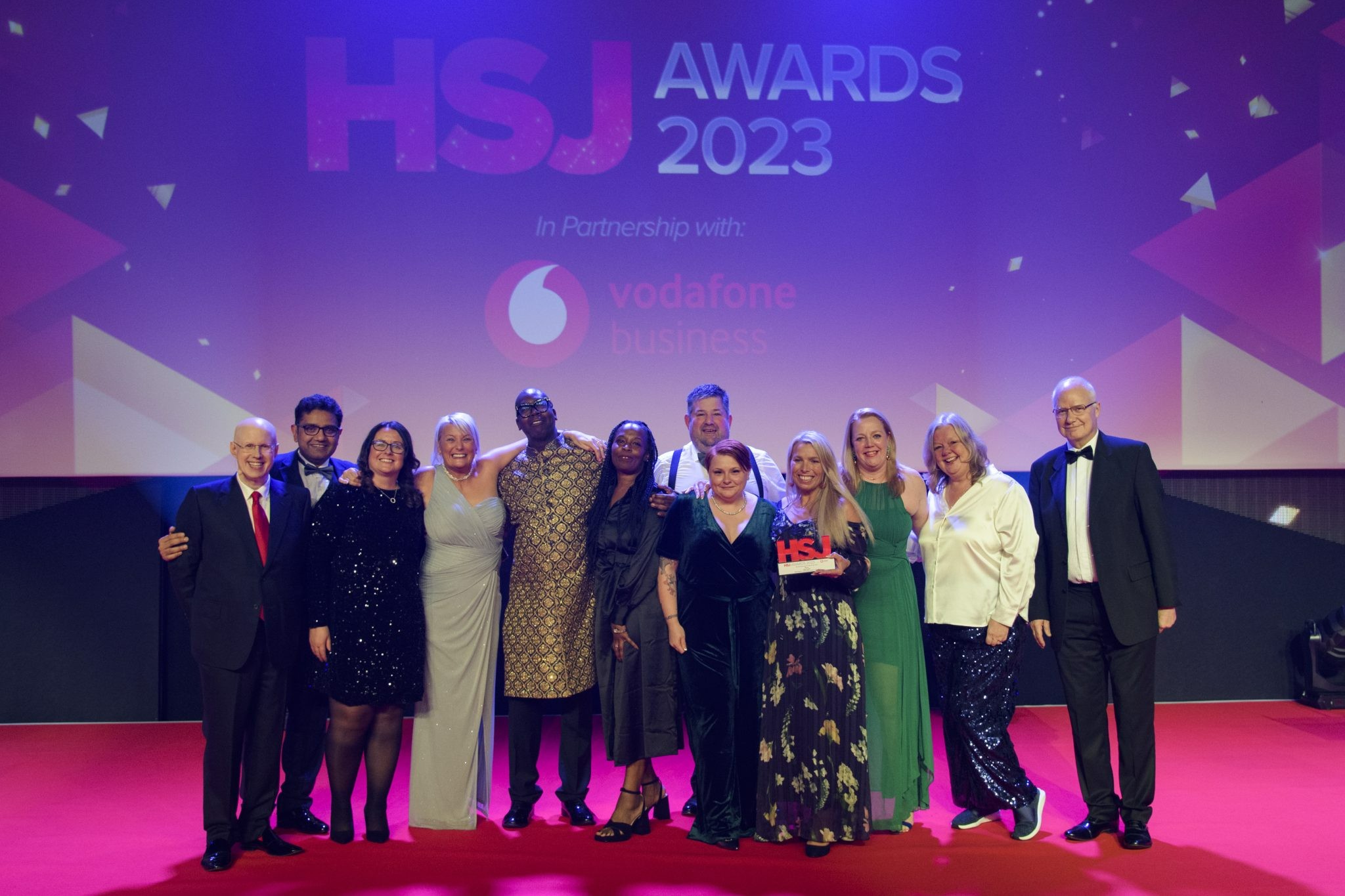 Walsall Together team posing after winning the Place Based Partnership and Integrated Care Award at the HSJ Partnership awards